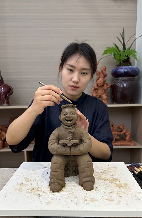 张玉萍丹钧泥塑炫彩河南非遗百名新青年沙龙活动